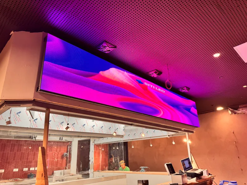 50/50 Burger Steaks at Opus Mall LED installation with pixel pitch P2.5.